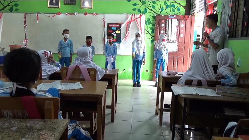 Kabut Asap Selimuti Kota Pekanbaru, Proses Belajar Mengajar Mulai Gunakan Masker