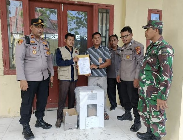 Polisi Kawal Ketat Logistik Pemungutan Suara Ulang di Bangko Pusako Rohil
