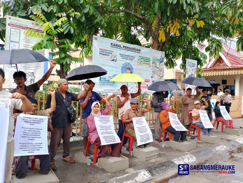 Aksi Cor Semen Kaki Warga Rokan Hilir di Kanwil BPN Riau, Desak PT Salim Ivomas Pratama Tunaikan Kewajiban Kebun Plasma Syarat Perpanjangan HGU