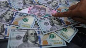 Investor Menahan Napas, Rupiah Terpukul Jelang Pengumuman BI dan The Fed